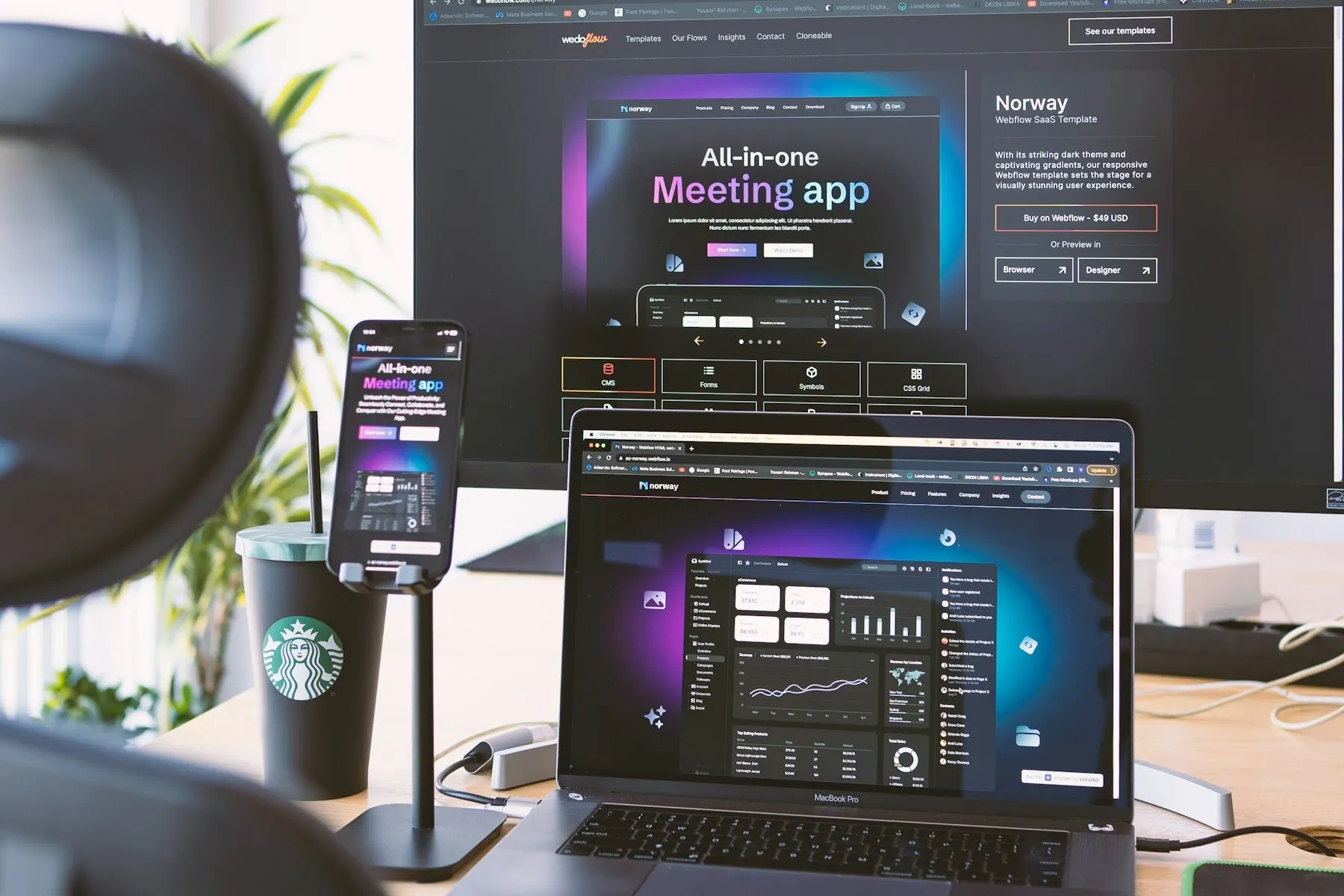Interface work spread across a laptop, phone, and display.